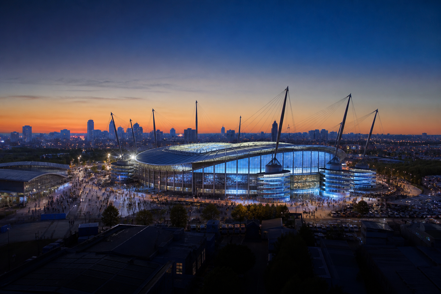 Etihad Stadium exterior glowing before a Manchester City home match