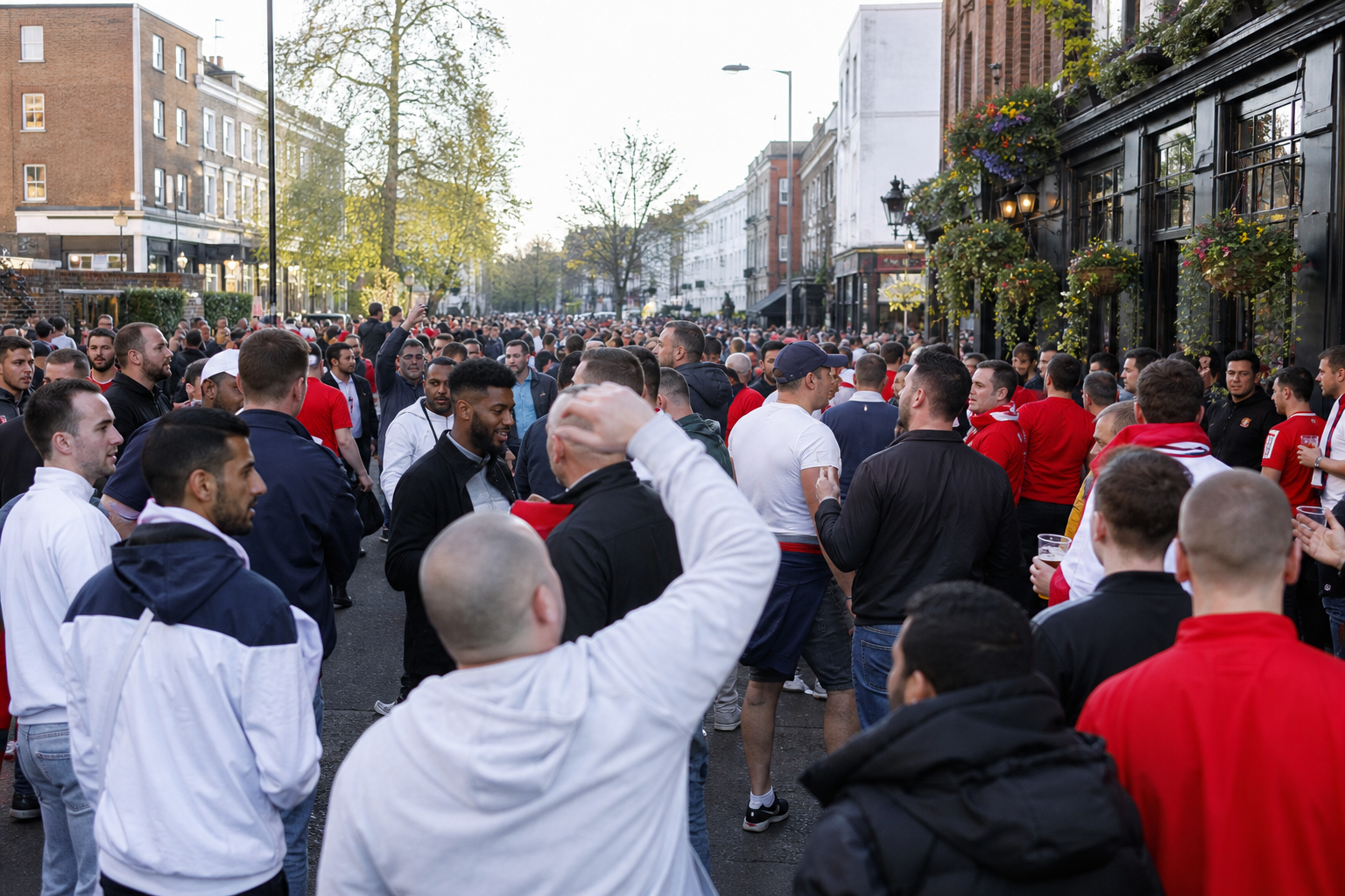 North London street filled with rival football supporters on derby day