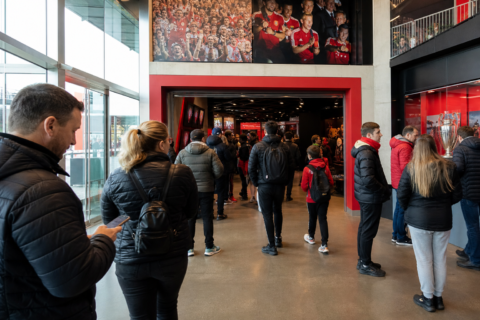 Visitors entering the Manchester United museum and stadium tour entrance