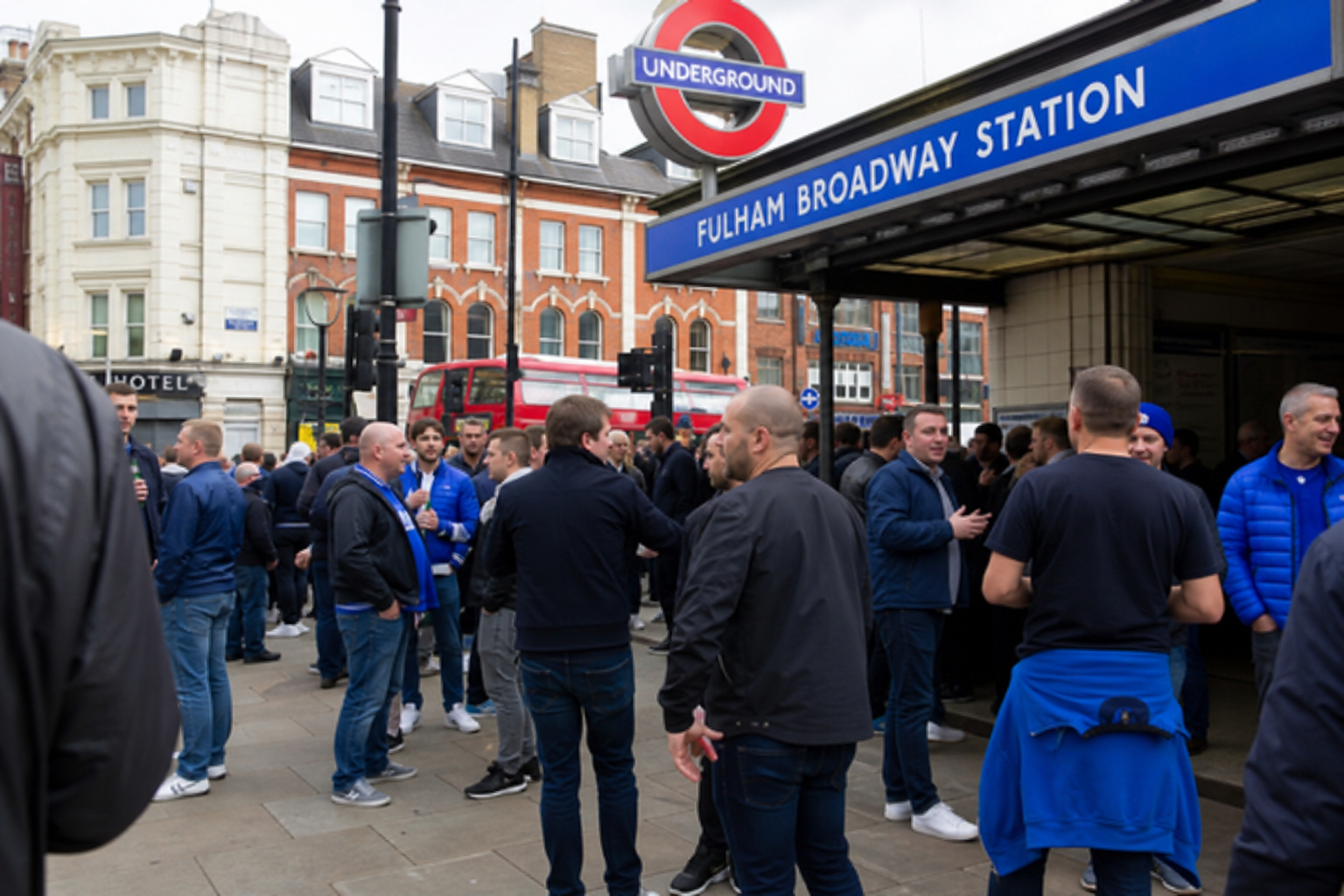 Travelling fans approaching Stamford Bridge for a Premier League game