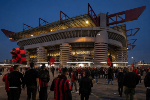 San Siro stadium exterior with Rossoneri supporters arriving before kick-off